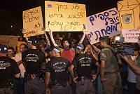 Residents of Kfar Shalem (many of whom were eventually evicted after a contractor bought land in the neighborhood to build luxury apartments) and social activists demonstrate against unjust housing policies, July 2007.<br>Oren Ziv/activestills.org<br>