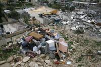 The demolition of a house in Wadi Kadum, East Jerusalem. In the foreground are the family's belongings, disposed of by Municipality workers, March 2007.<br>Keren Manor/activestills.org<br><br><br>