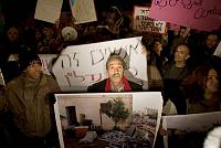 Reuven Abergil, a legendary social activist, demonstrates outside of Tel Aviv Mayor Ron Huldai's home, in December 2007, after dozens of families were evicted and their homes demolished. Hundreds of people participated in the demonstration, demanding that authorities stop their policy of eviction and house demolition.<br>Oren Ziv/activestills.org<br>
