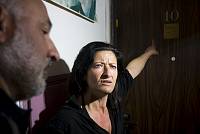 Rachel, a single mother, and Haim Bar Yaakov, a housing rights activist, succeed in preventing Rachel and her family's eviction from her apartment in Yavne, April 2008. <br>Oren Ziv/activestills.org<br>